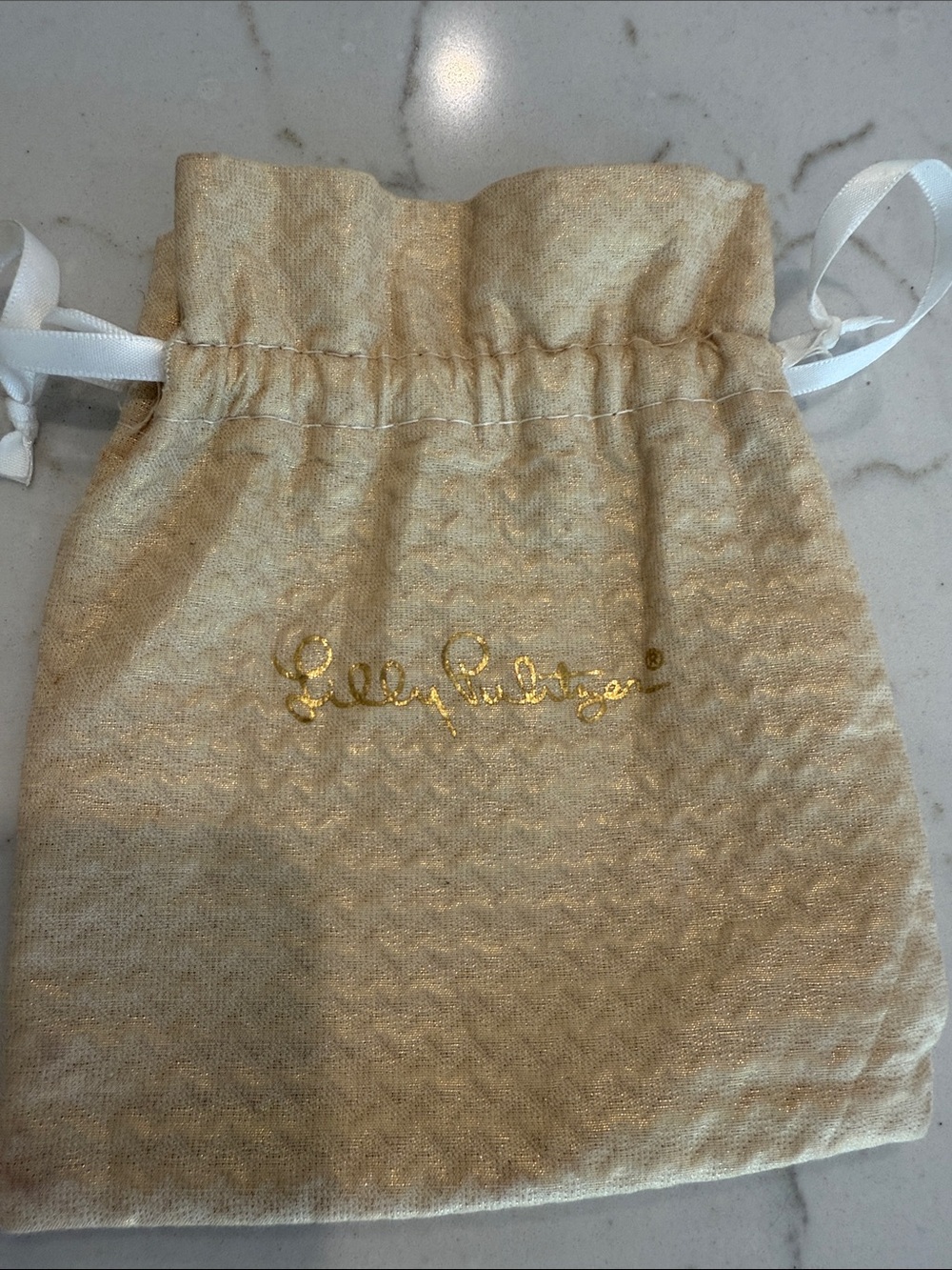 Lilly Pulitzer metallic textured Cream Drawstring jewelry Pouch Gold Script